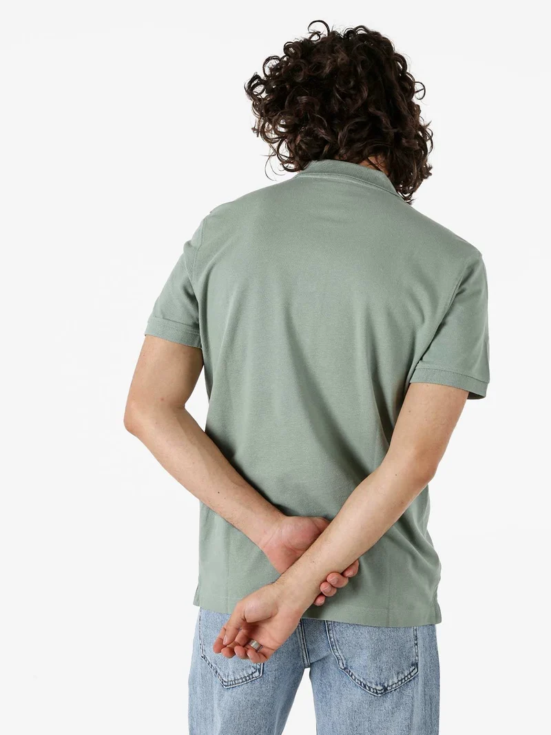 Polo da uomo in cotone a maniche corte - pistacchio