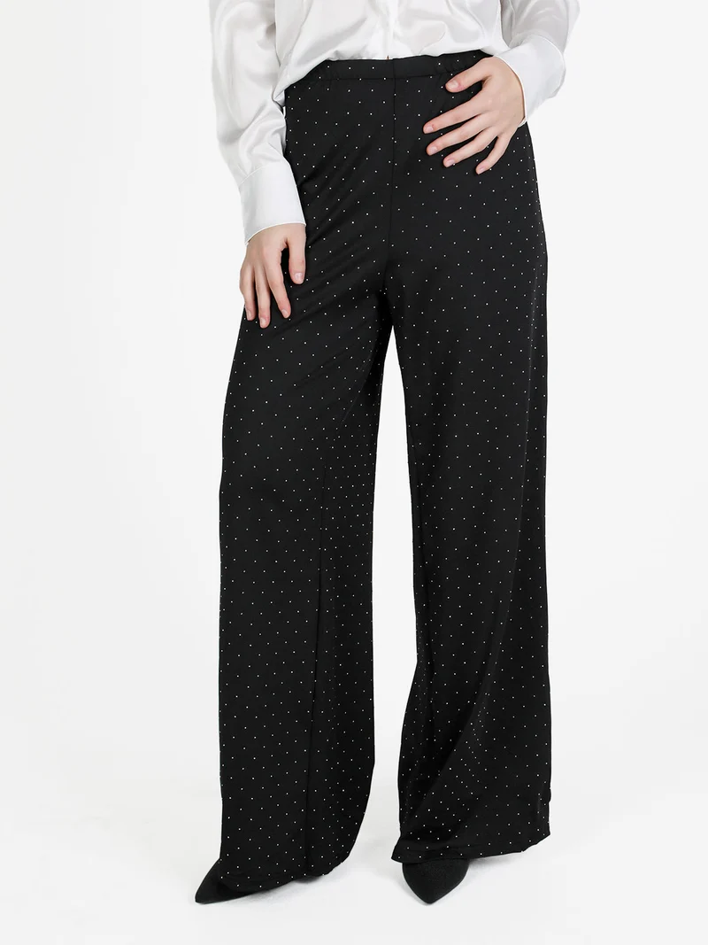Pantaloni donna a gamba larga con borchie lucciccanti - nero