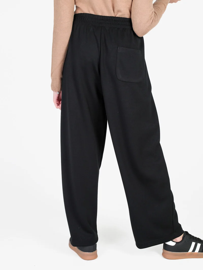 Pantaloni donna in panno a gamba larga - nero