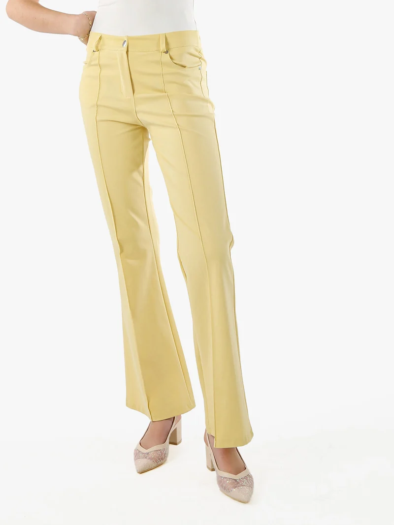 Pantaloni donna a zampa con cucitura centrale - giallo