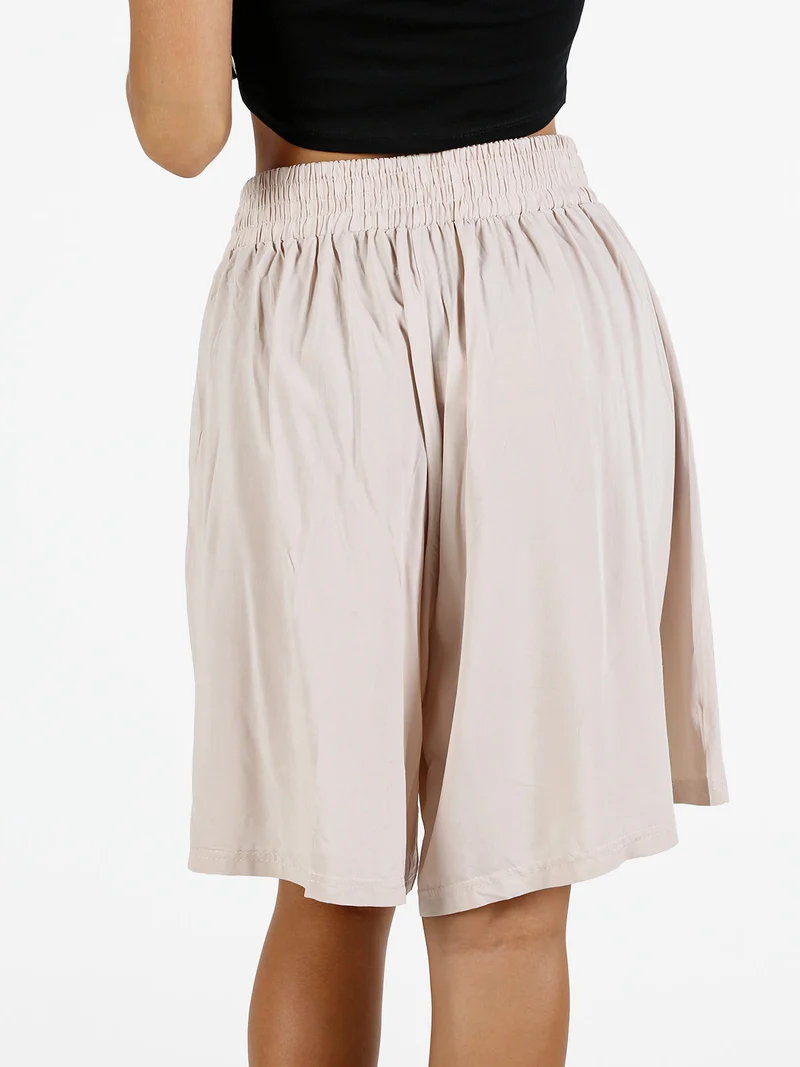 Shorts donna in cotone a gamba larga - beige