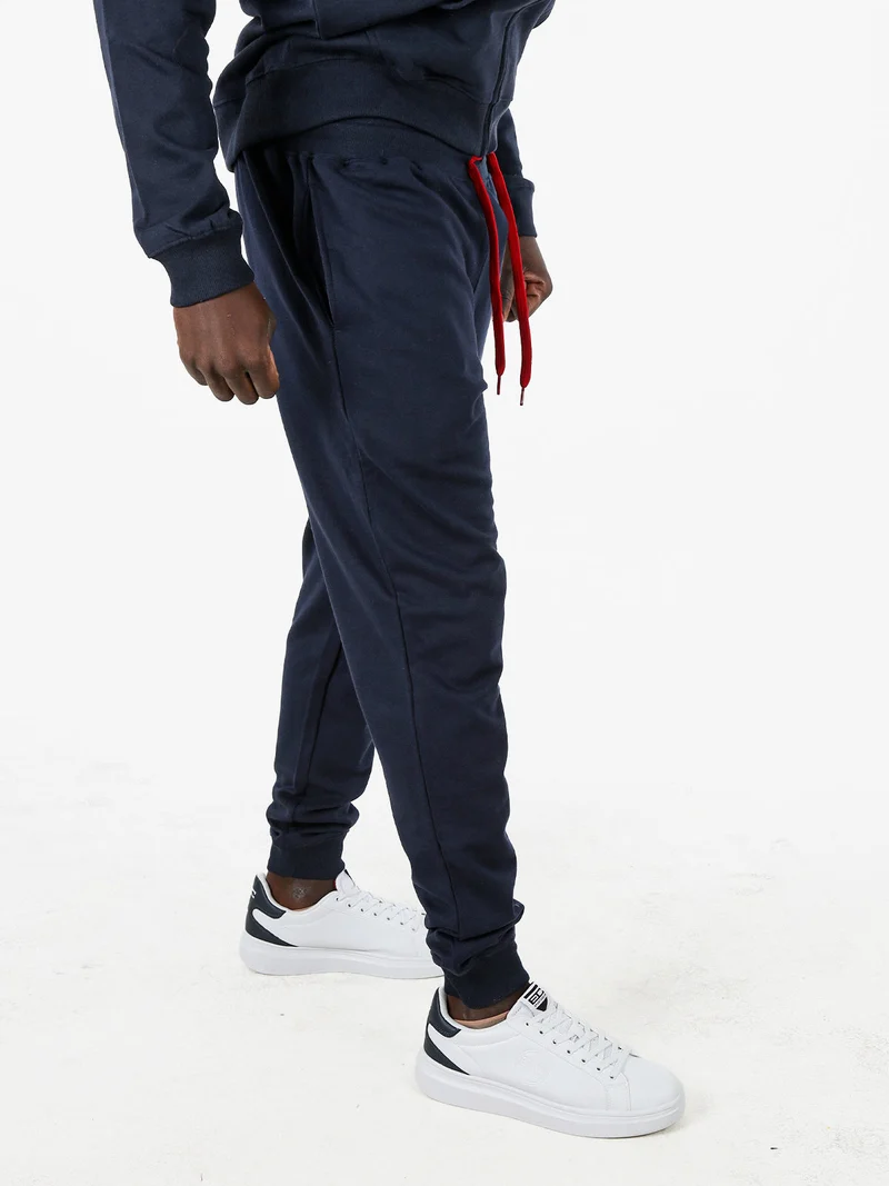 Pantaloni tuta da uomo con coulisse e polsini - blu