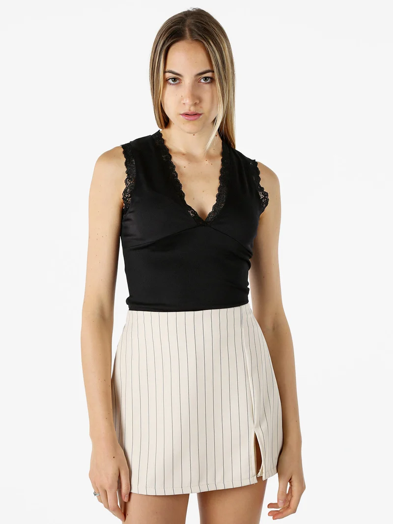 Top donna elasticizzato con dettagli di pizzo - nero