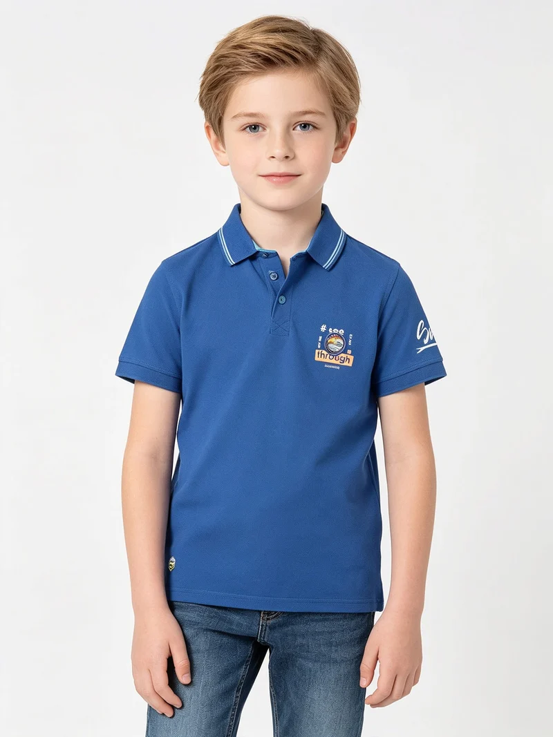 Polo da bambino a manica corta con scritta - blu