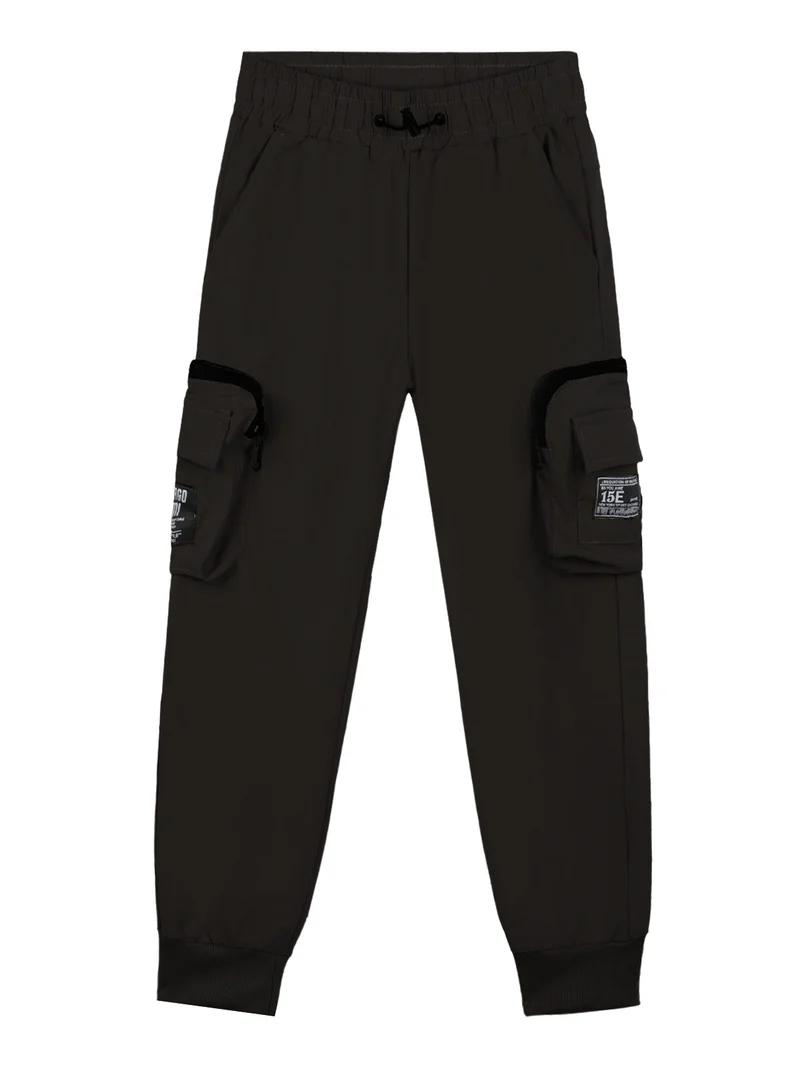 Pantaloni da bambino con tasconi e polsini alle caviglie - nero