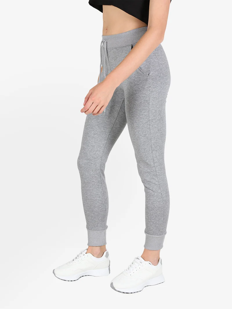 Pantaloni tuta da donna con coulisse e polsini - grigio