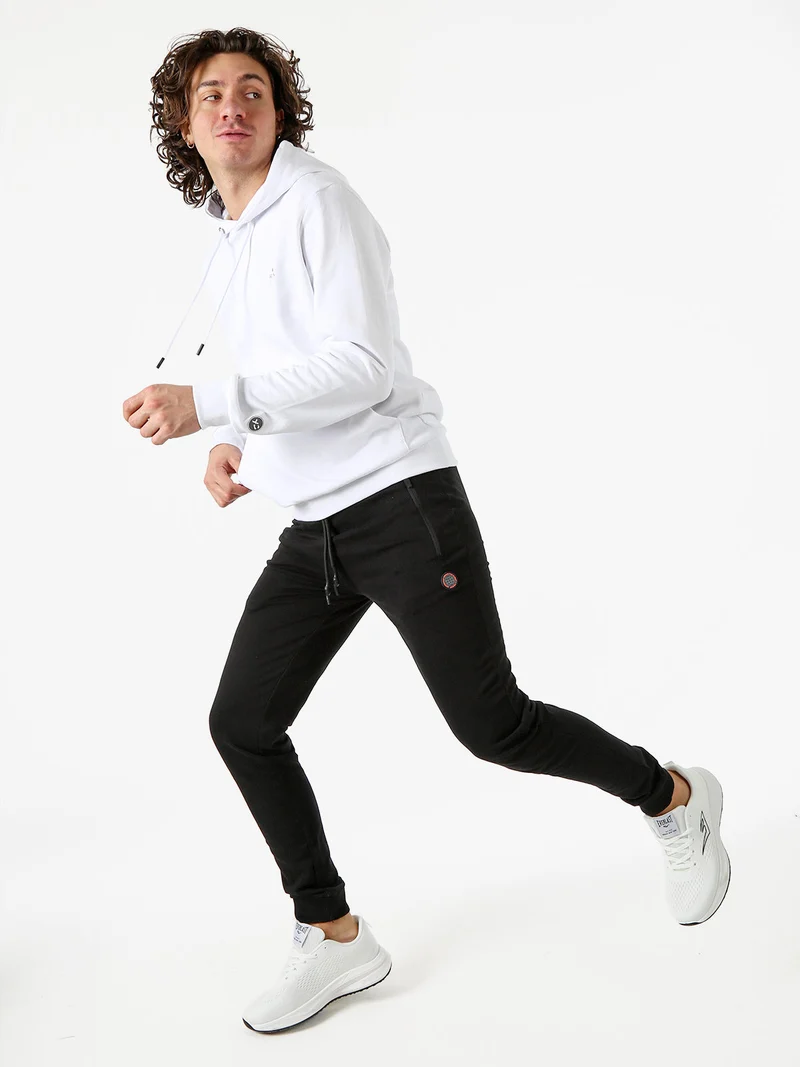 Pantaloni sportivi da uomo in cotone con coulisse e polsini - nero