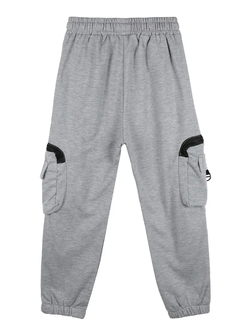 Pantaloni tuta da bambino con tasconi laterali e polsini - grigio