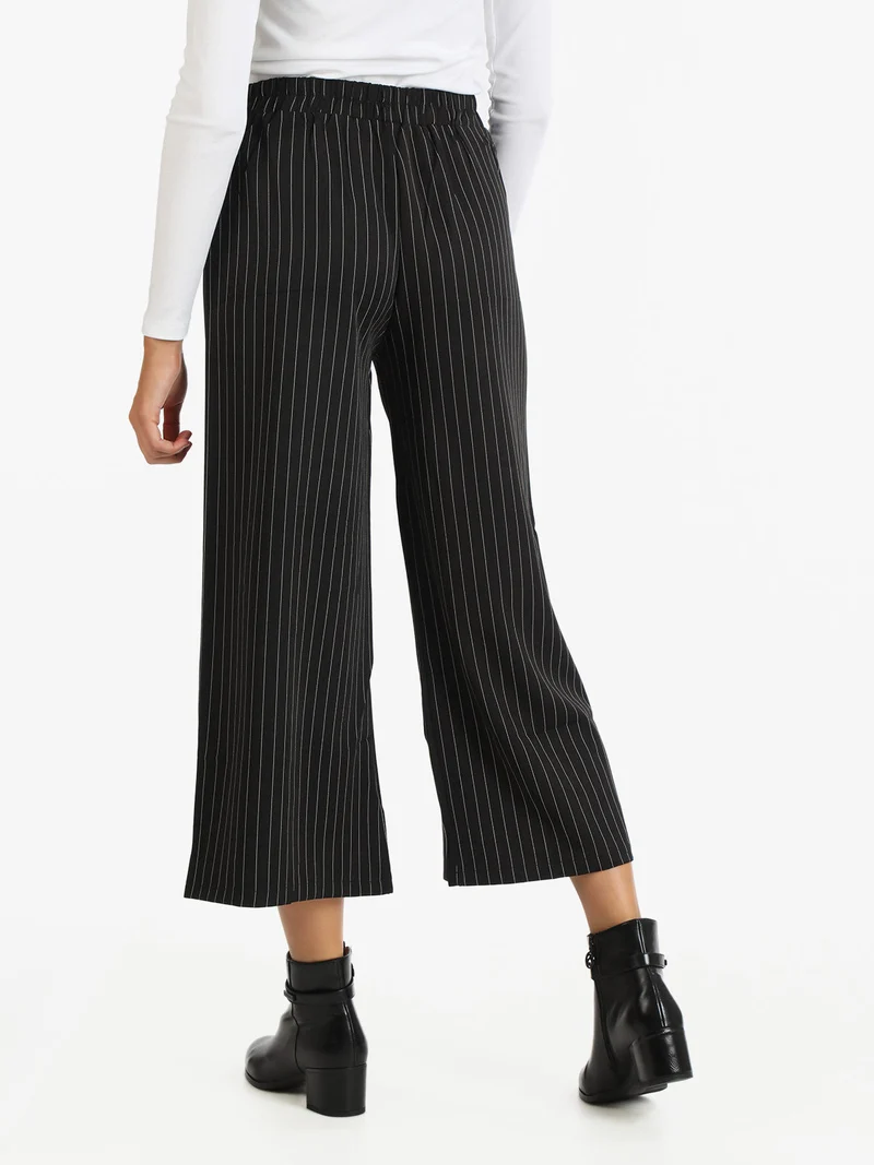 Pantaloni gessati donna a gamba larga - nero
