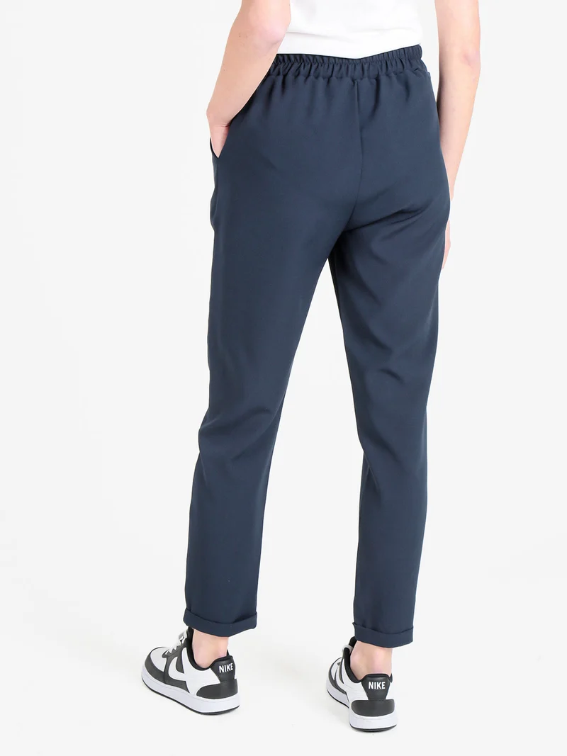 Pantaloni classici da donna con risvolto - blu scuro