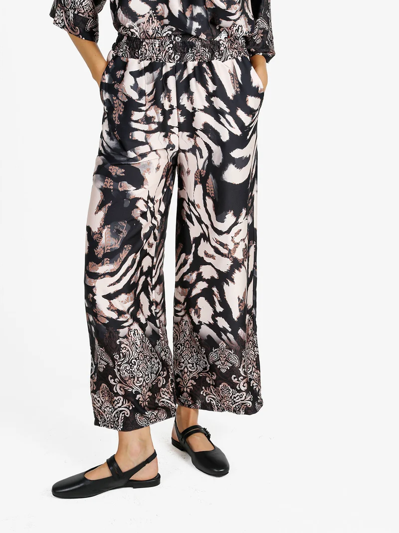 Pantaloni donna effetto raso con stampe - nero