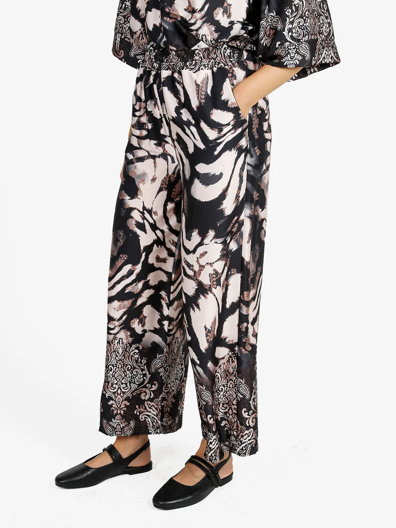 Pantaloni donna effetto raso con stampe - nero