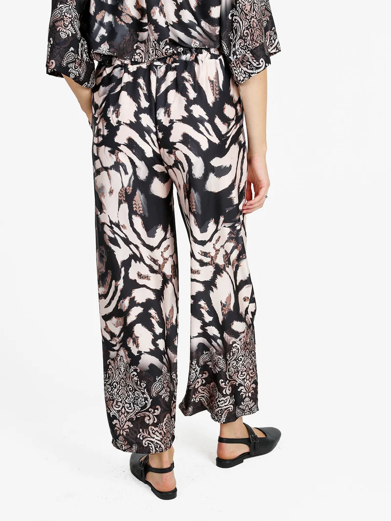 Pantaloni donna effetto raso con stampe - nero