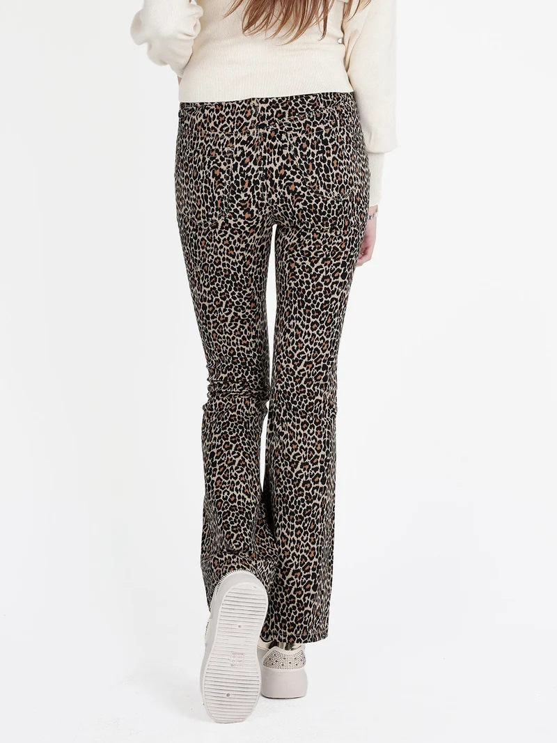 Pantaloni donna maculati slim fit a zampa - caffè