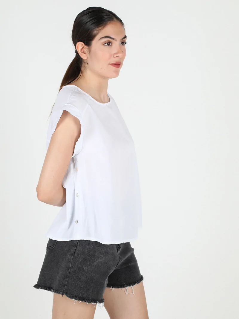 Blusa donna in cotone con bottoni laterali - bianco