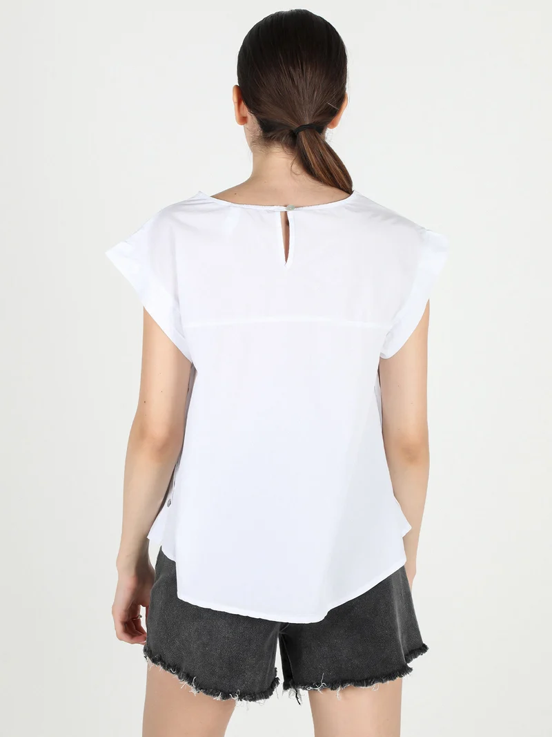 Blusa donna in cotone con bottoni laterali - bianco