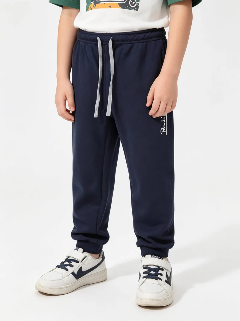 Pantaloni tuta da bambino felpati - grigio