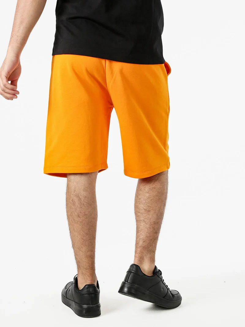 Bermuda sportivi da uomo in cotone con logo - arancione