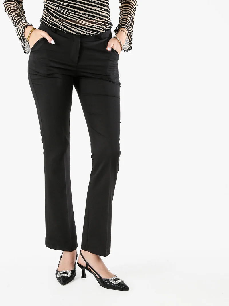 Pantaloni eleganti da donna a zampa - nero