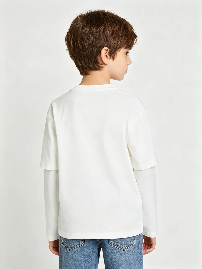T-shirt da bambino a maniche lunghe in cotone con scritte - bianco