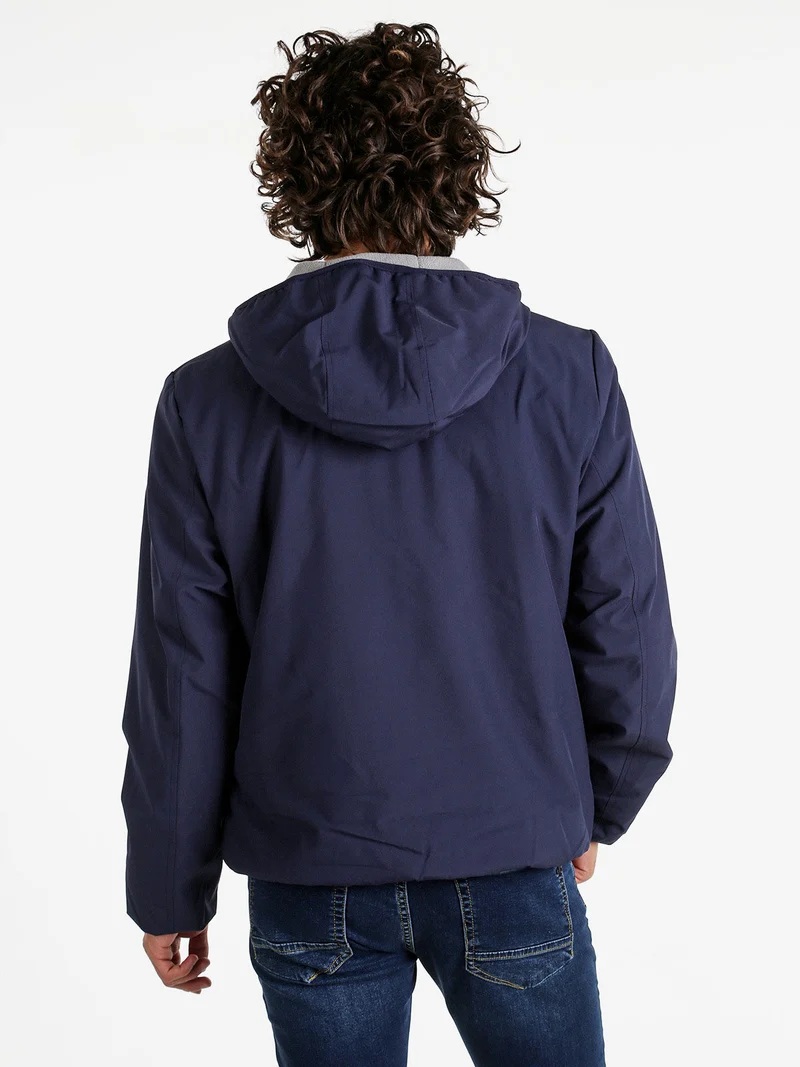 Giubbotto impermeabile da uomo con cappuccio e zip - blu scuro