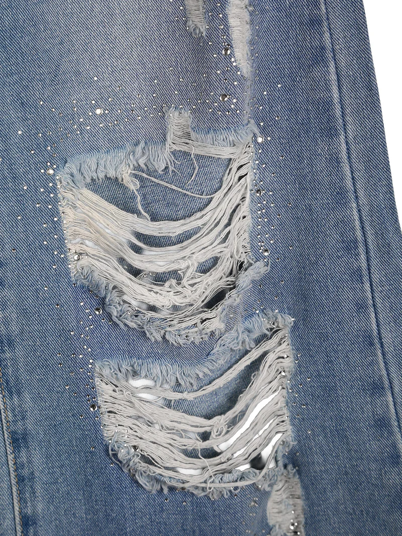 Jeans baggy da bambina con strappi e strass - jeans