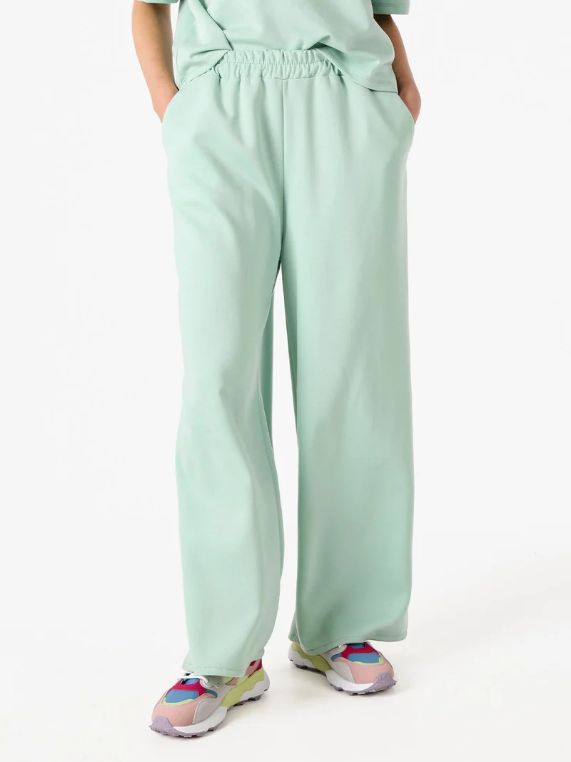 Pantaloni donna in felpa a gamba larga - acqua marina