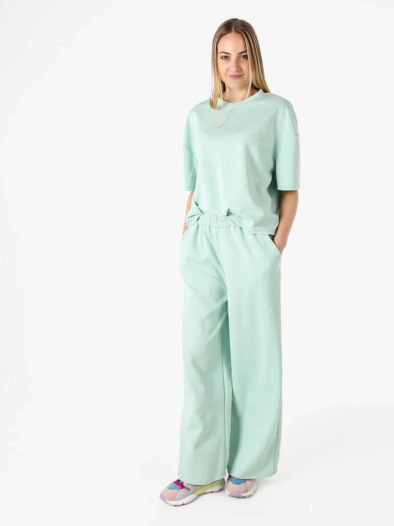 Pantaloni donna in felpa a gamba larga - acqua marina