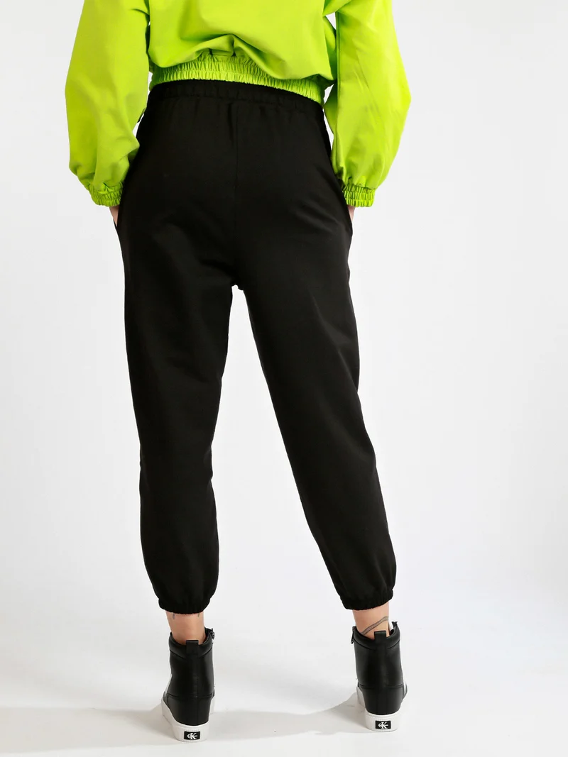 Pantaloni in felpa da donna - nero