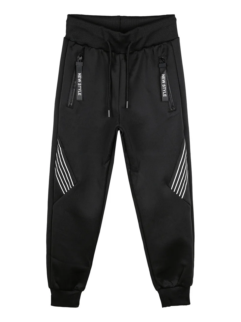 Pantaloni da bambino con coulisse e polsini - nero