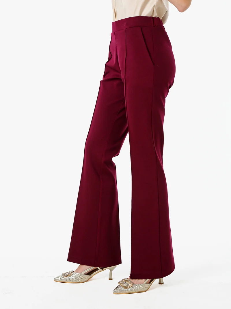 Completo elegante da donna con blazer e pantaloni con finale a zampa - bordeaux