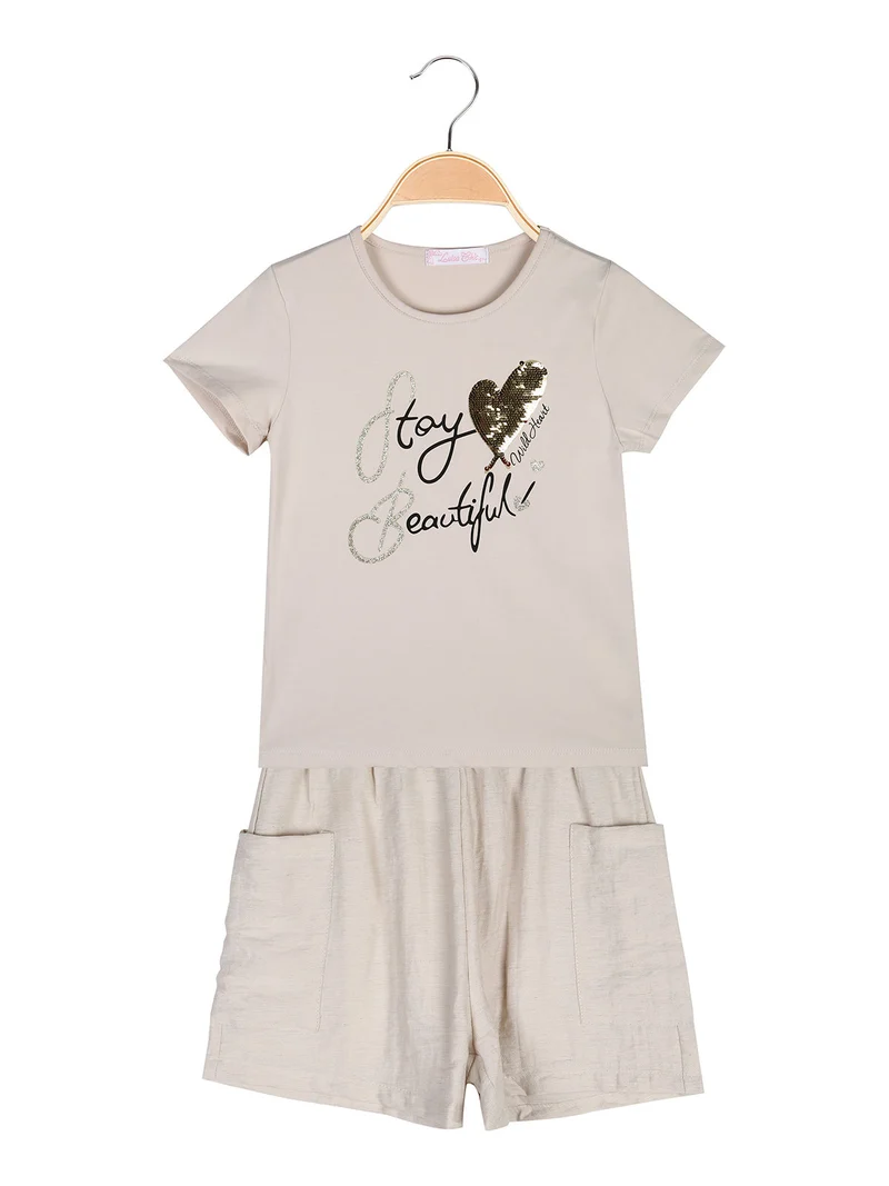 Completo corto da ragazza con t-shirt e shorts in cotone - beige