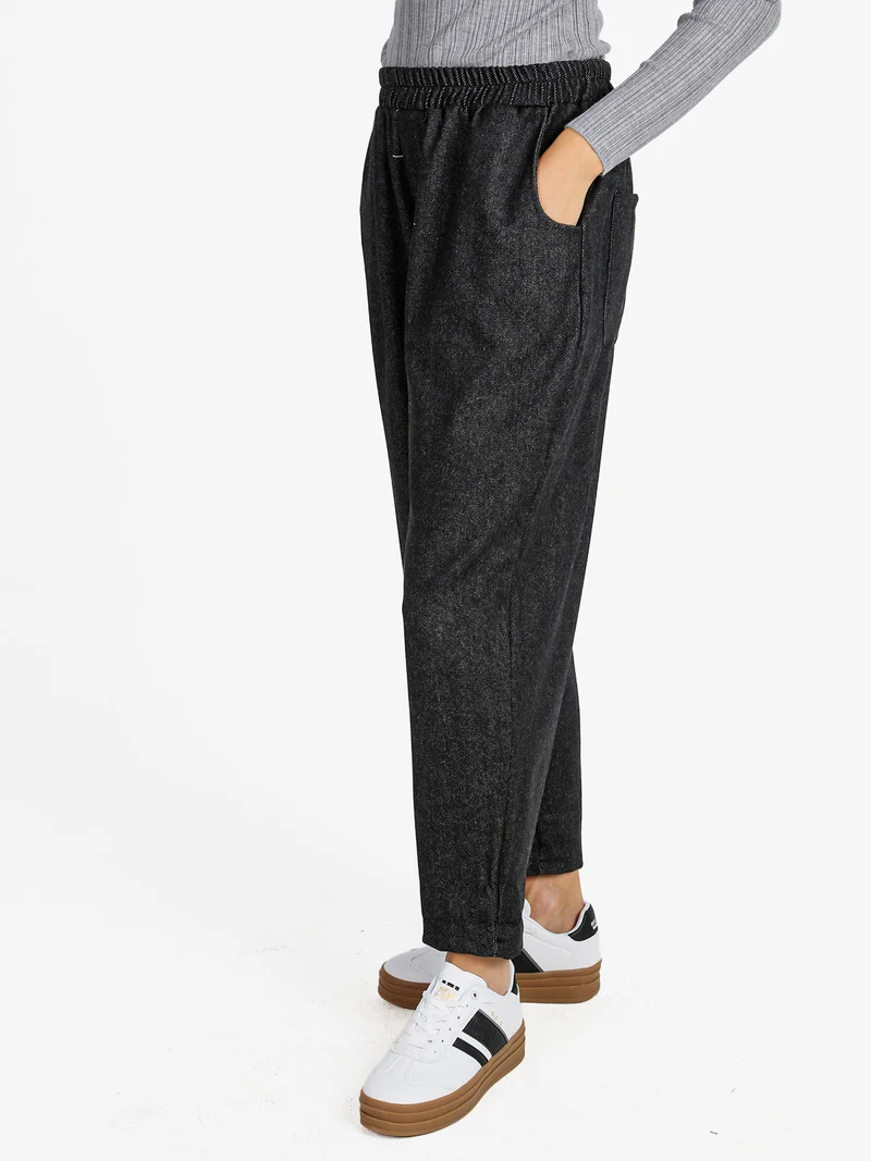 Pantaloni donna a cavallo basso con elastico in vita - nero