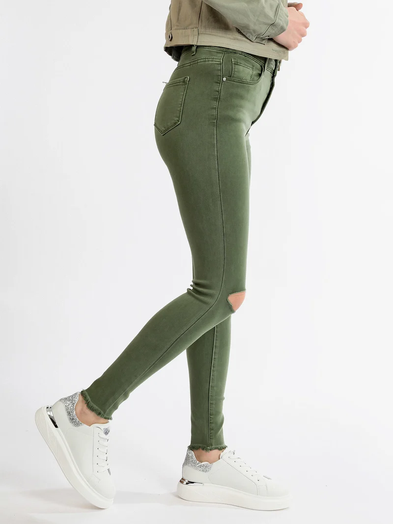 Pantaloni donna elasticizzati con strappi - verde