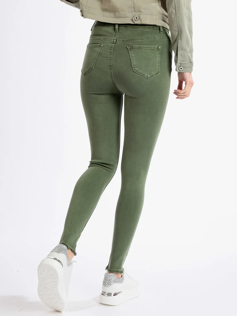 Pantaloni donna elasticizzati con strappi - verde