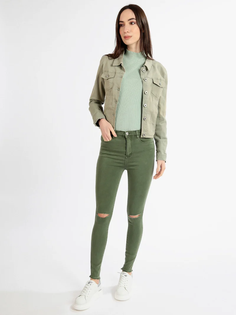 Pantaloni donna elasticizzati con strappi - verde