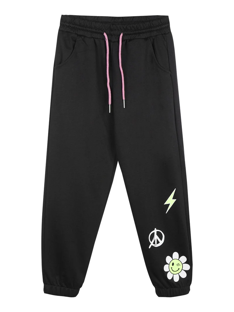 Pantaloni tuta da bambina con stampa e polsini - nero