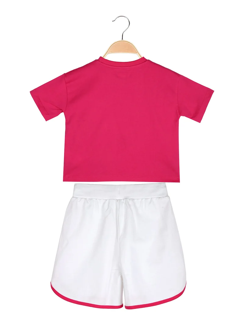 Completo corto da bambina con t-shirt cropped e shorts - fucsia