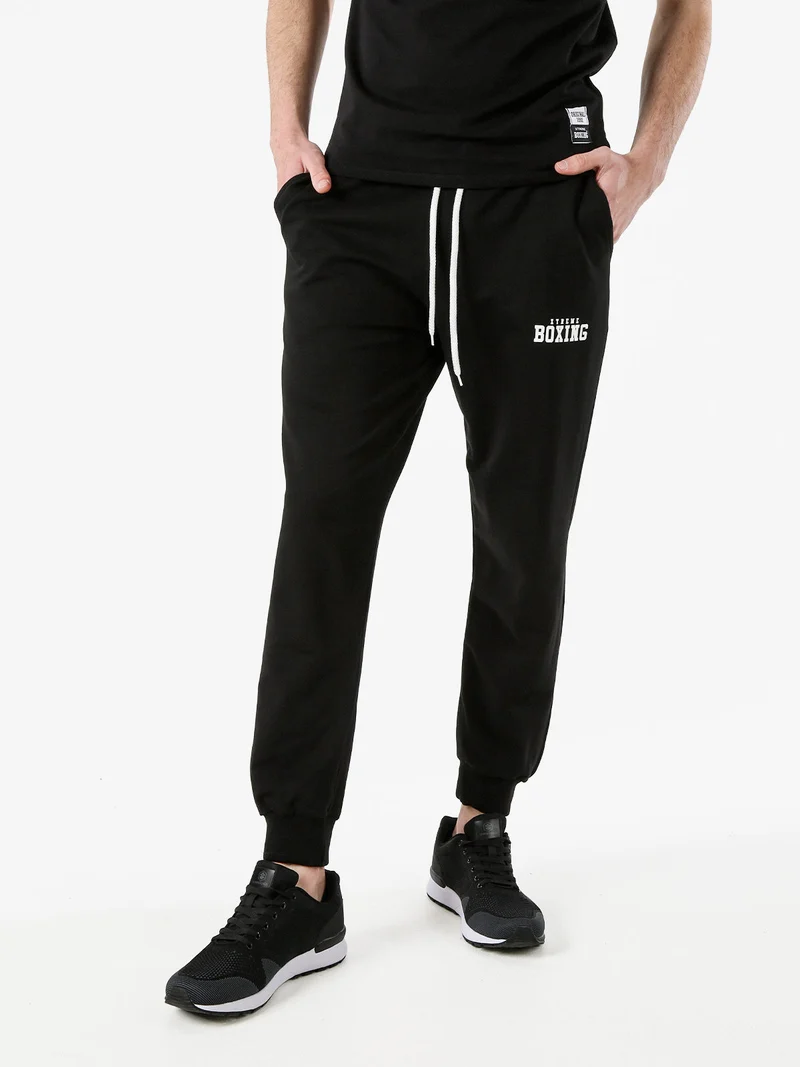 Pantaloni sportivi da uomo in cotone con coulisse e polsini - nero