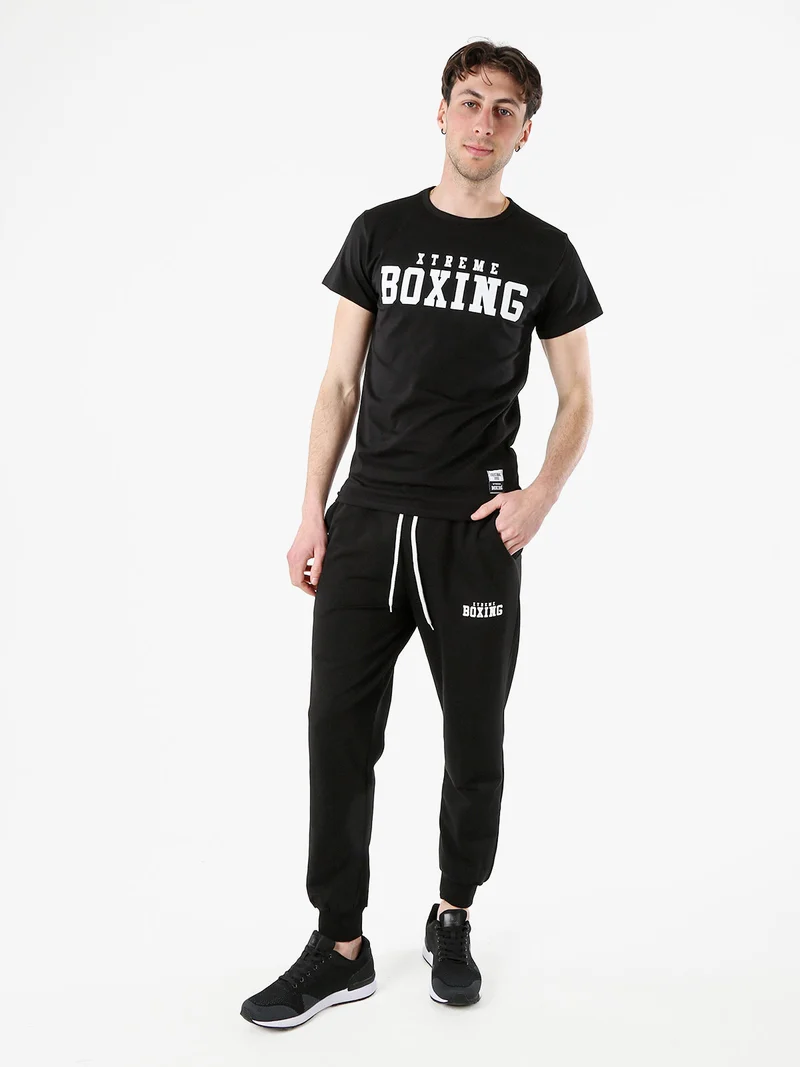 Pantaloni sportivi da uomo in cotone con coulisse e polsini - nero