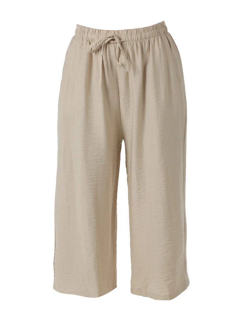 Pantaloni donna cropped a gamba larga con coulisse - beige