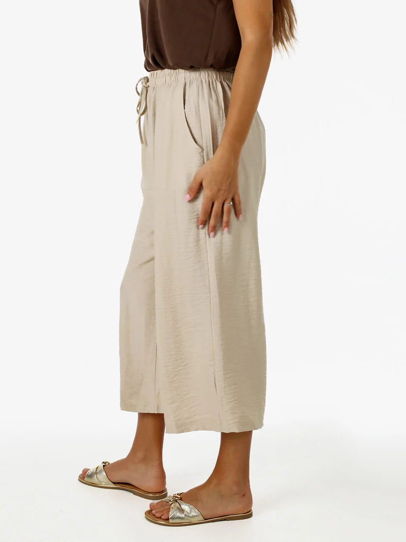 Pantaloni donna cropped a gamba larga con coulisse - beige