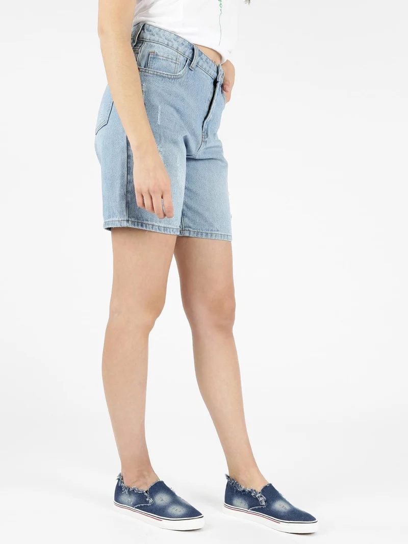 Pantaloncini mom strappati in jeans