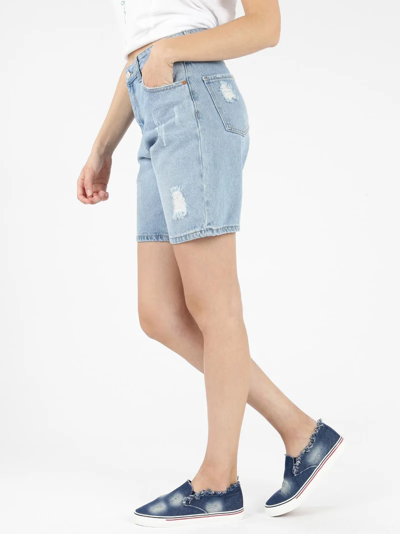 Pantaloncini mom strappati in jeans