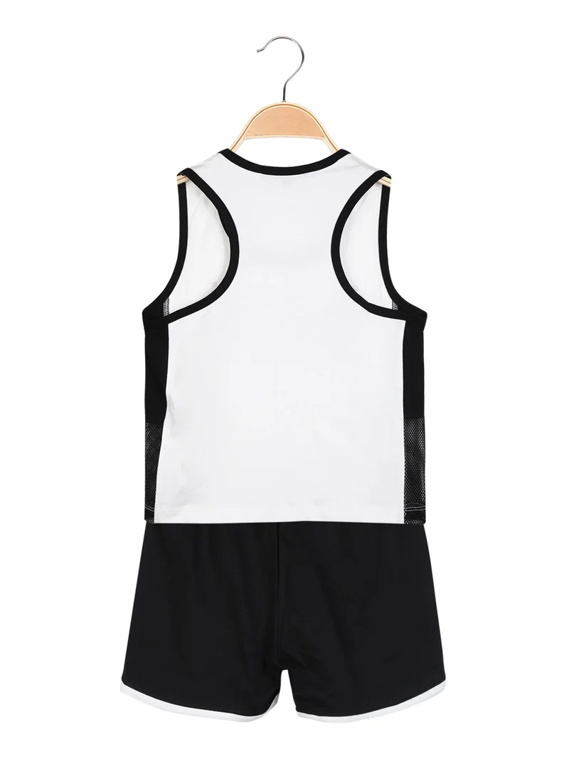 Completo corto sportivo 2 pezzi da bambina - bianco
