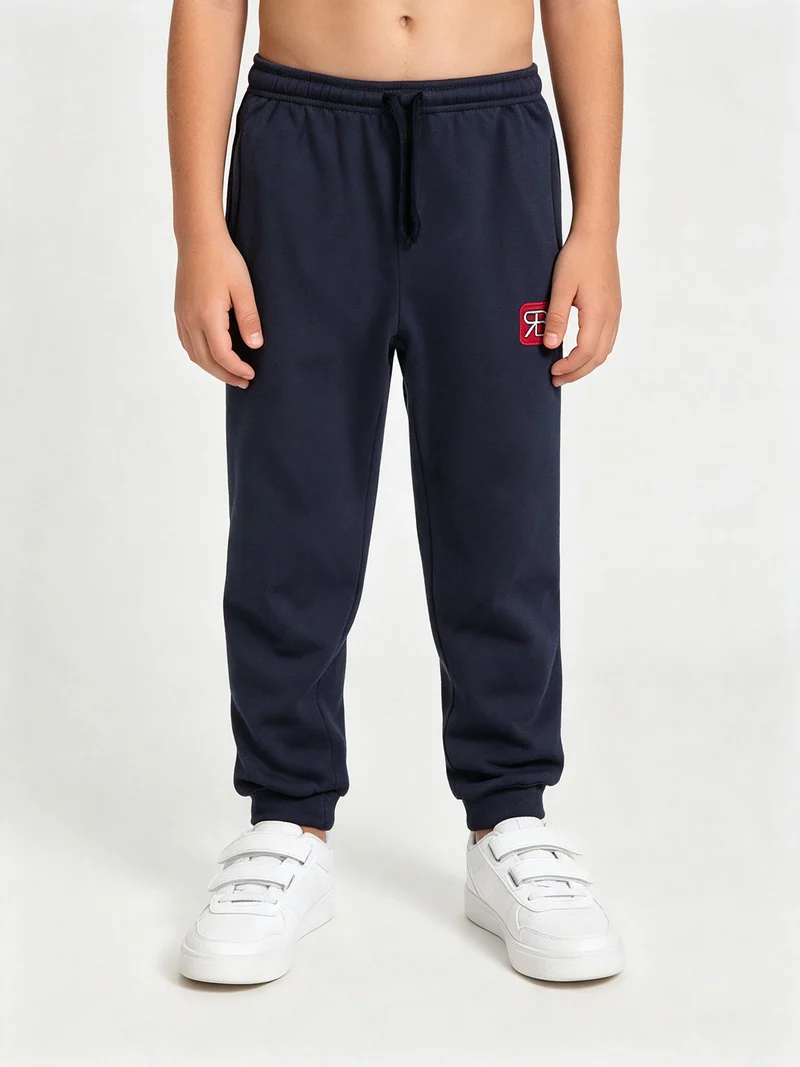 Pantaloni tuta da bambino felpati - rosso
