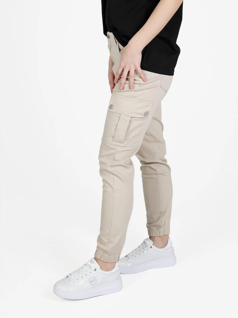 Pantaloni cargo da donna con elastico alla caviglia - beige