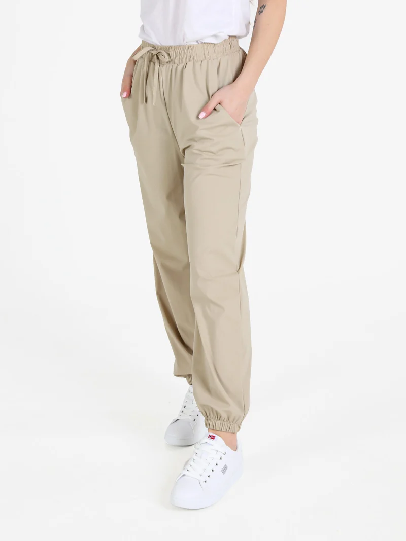 Pantaloni donna in tessuto tecnico con polsini - sabbia