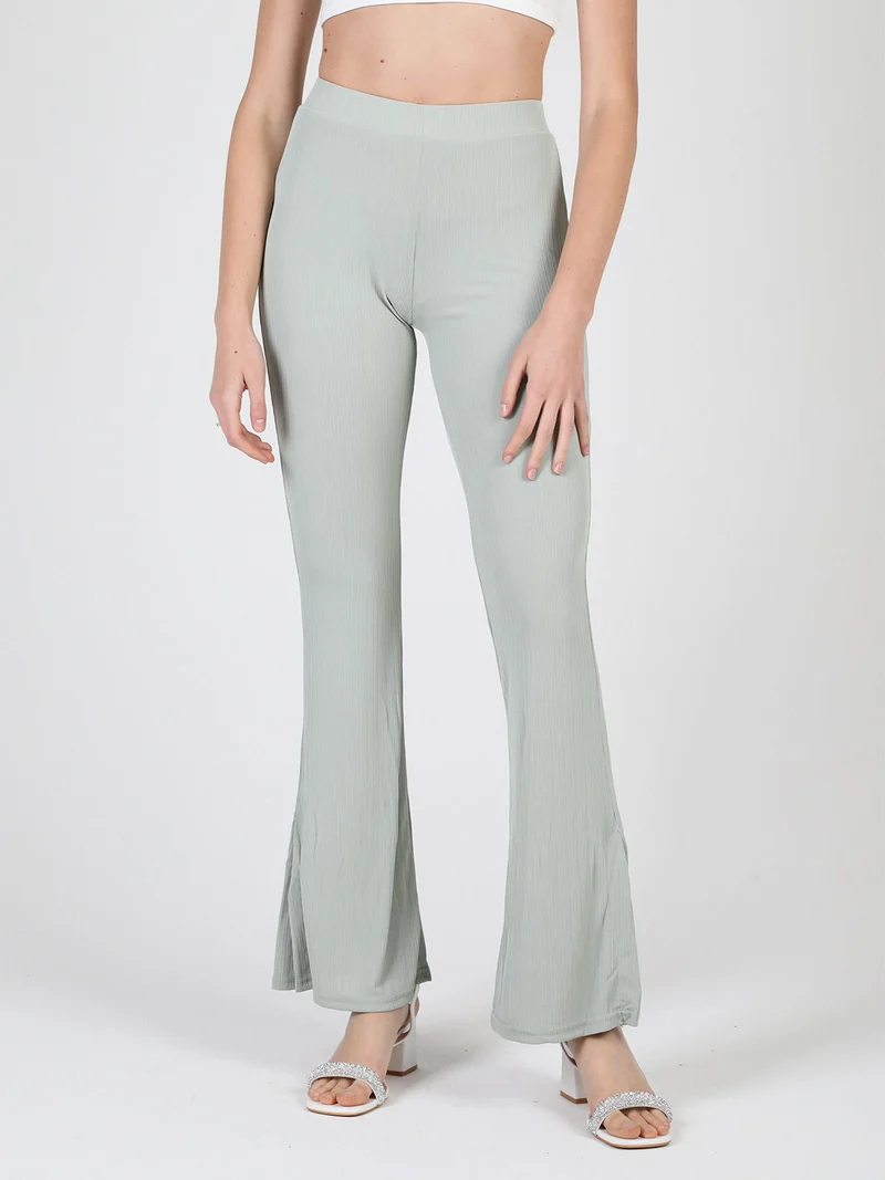 Leggings donna leggeri con finale a zampa e spacco laterale - verde
