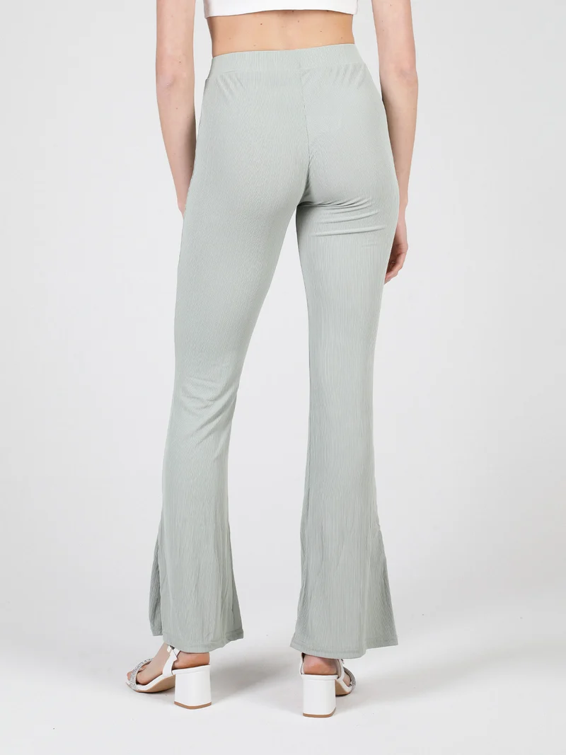 Leggings donna leggeri con finale a zampa e spacco laterale - verde